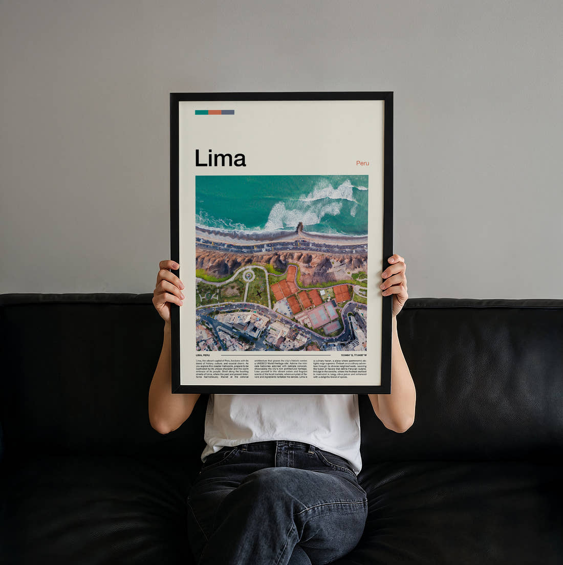Lima Coastal Cliffs From Above Travel Print held up by hand to show the size of the print