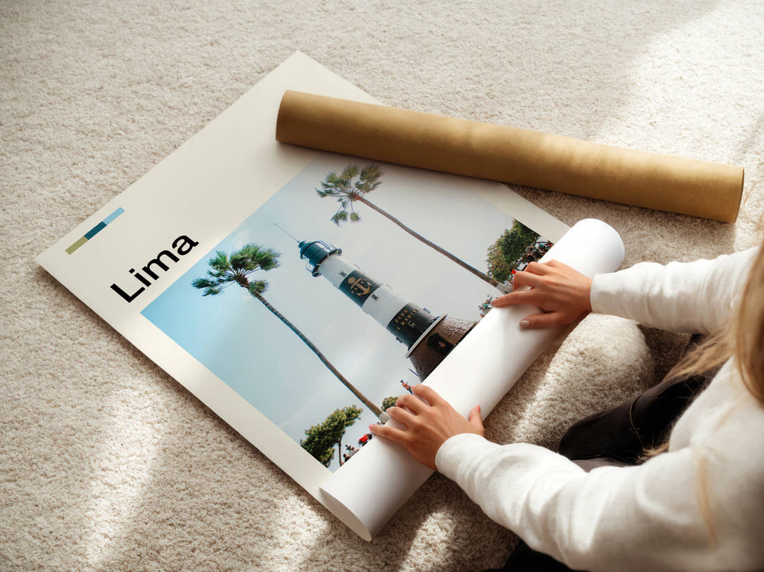 Lima Lighthouse And Palm Trees Travel Print being unrolled from its postal tube