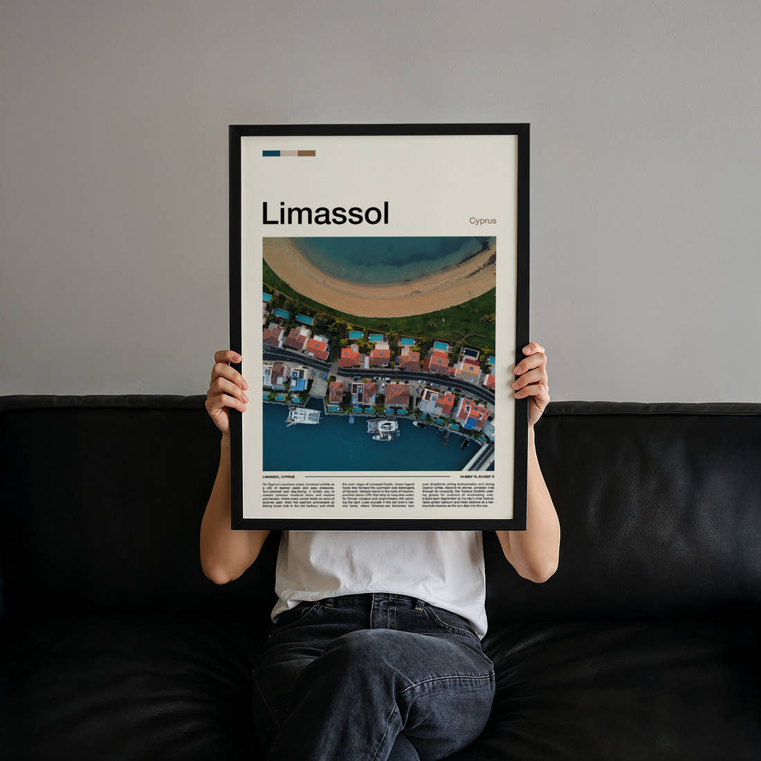 Limassol Coastal Marina From Above Travel Print held up by hand to show the size of the print