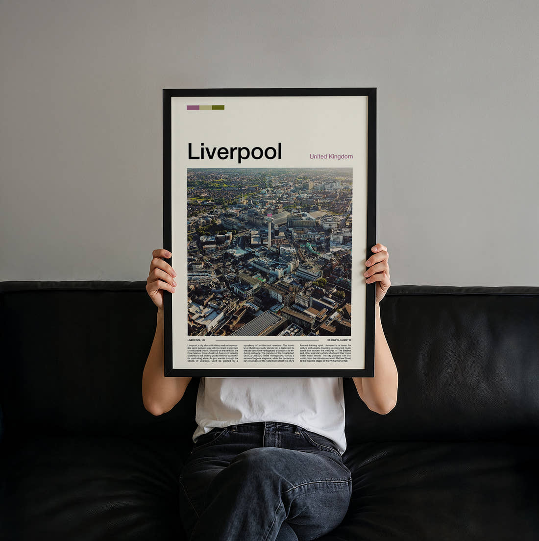 Liverpool Aerial View Of Rooftops Travel Print held up by hand to show the size of the print