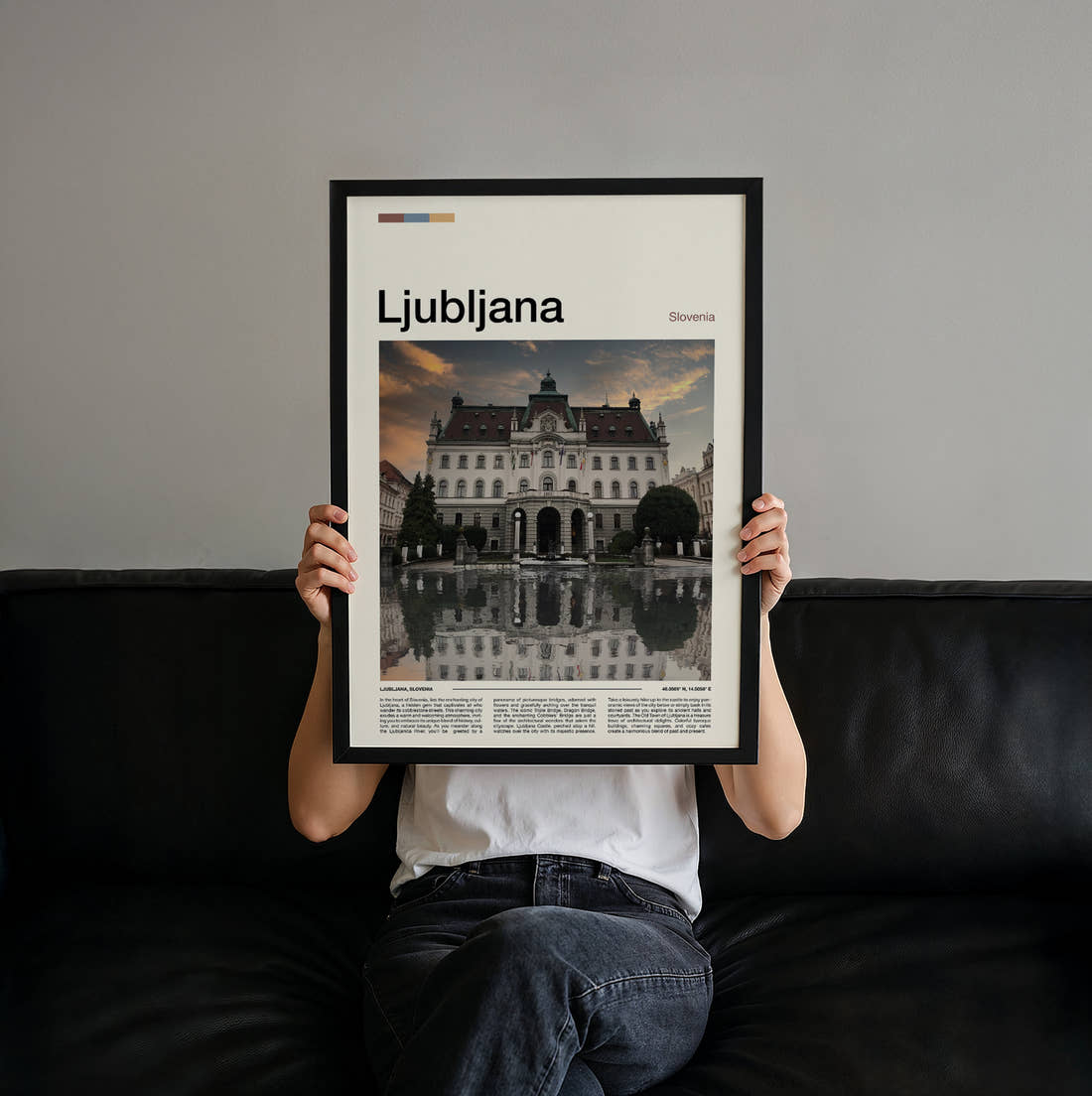 Ljubljana University Building Travel Print held up by hand to show the size of the print