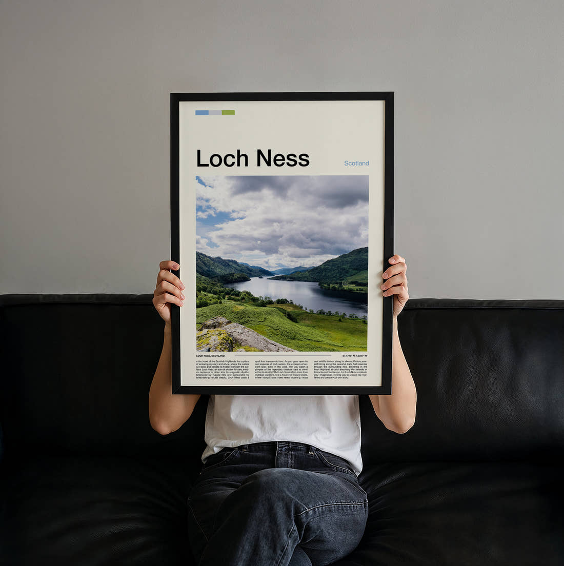 Loch Ness Green Hills And Loch Travel Print held up by hand to show the size of the print