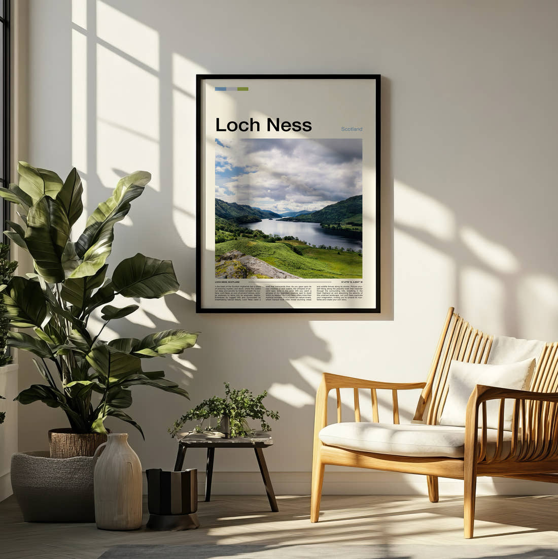 Loch Ness Green Hills And Loch Travel Print framed on a pale wall beside houseplants
