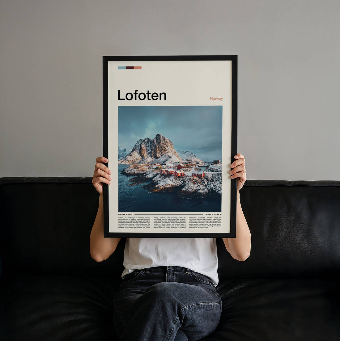Lofoten Snowy Island Village Travel Print held up by hand to show the size of the print