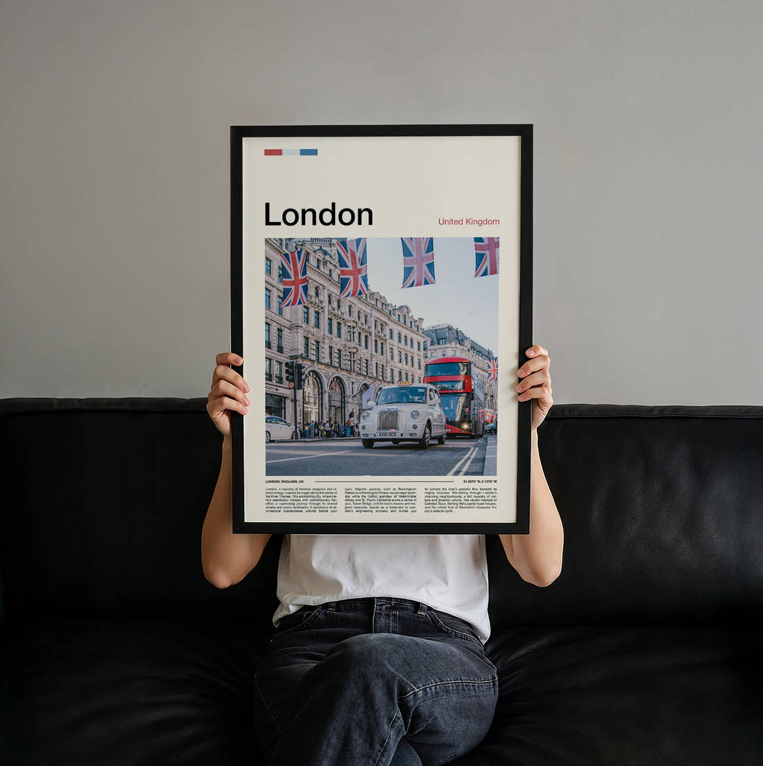 London Taxi Under Union Jacks Travel Print held up by hand to show the size of the print