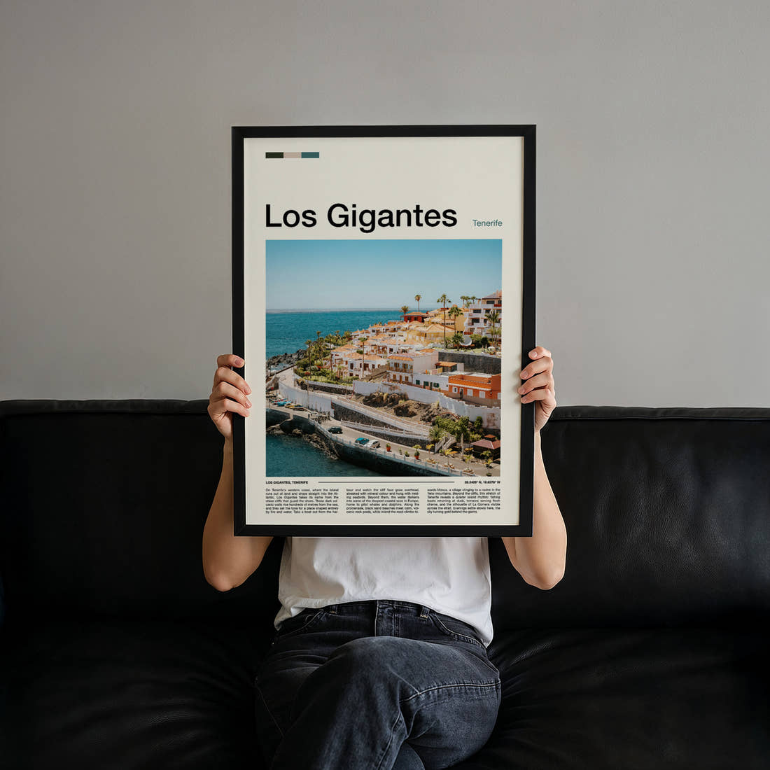 Los Gigantes Coastal Village Cliffs Travel Print held up by hand to show the size of the print