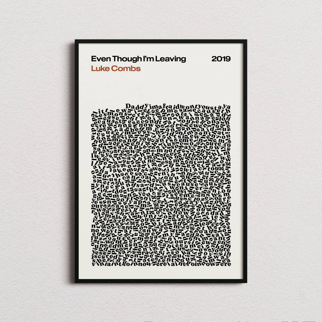 Luke Combs Even Though I'm Leaving Lyric Print in the cream colourway, framed
