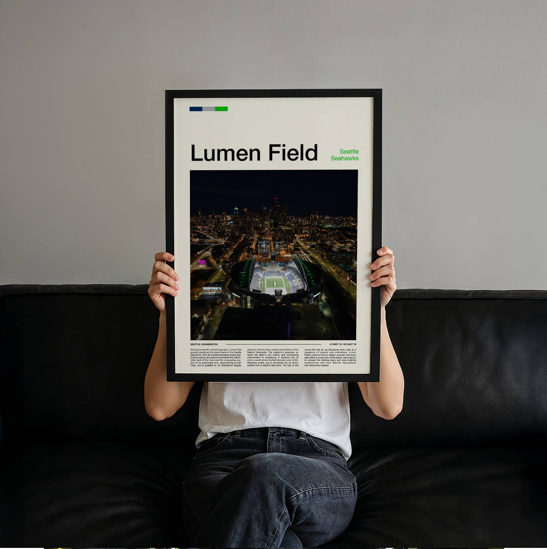 Lumen Field Stadium Print held up by hand to show the size of the print