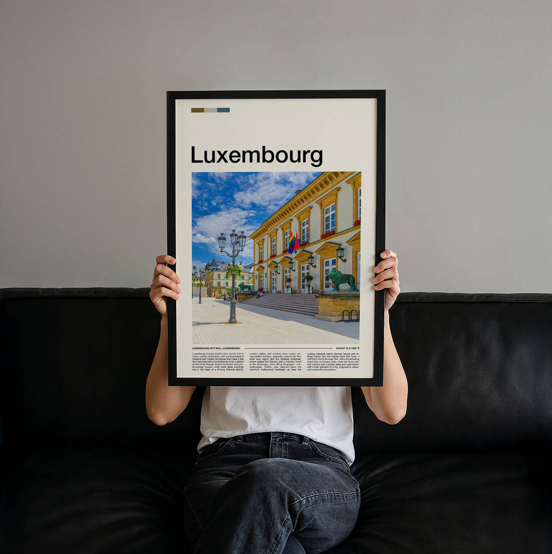 Luxembourg Town Hall Travel Print held up by hand to show the size of the print