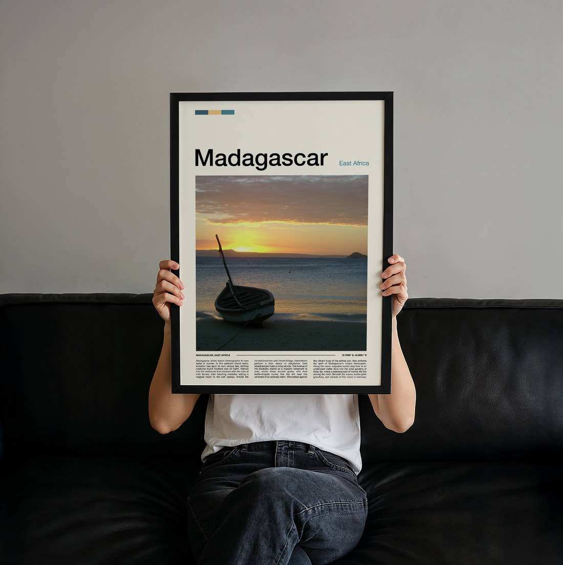 Madagascar Boat At Sunset Travel Print held up by hand to show the size of the print
