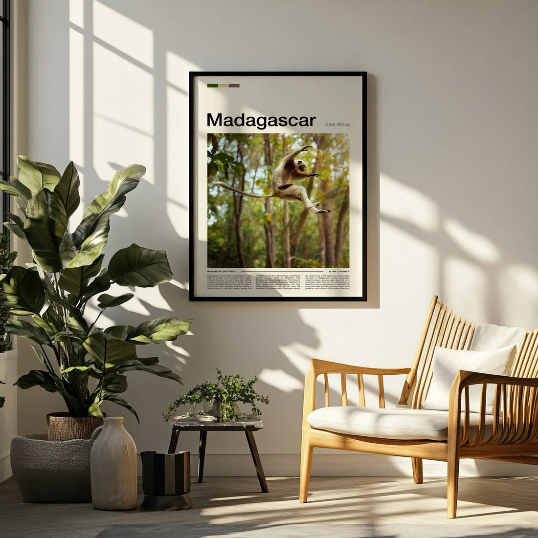 Madagascar Leaping Lemur Travel Print framed on a pale wall beside houseplants