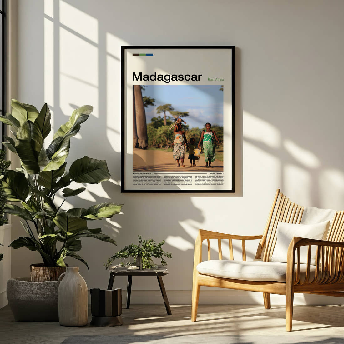 Madagascar People Walking By Baobabs Travel Print framed on a pale wall beside houseplants