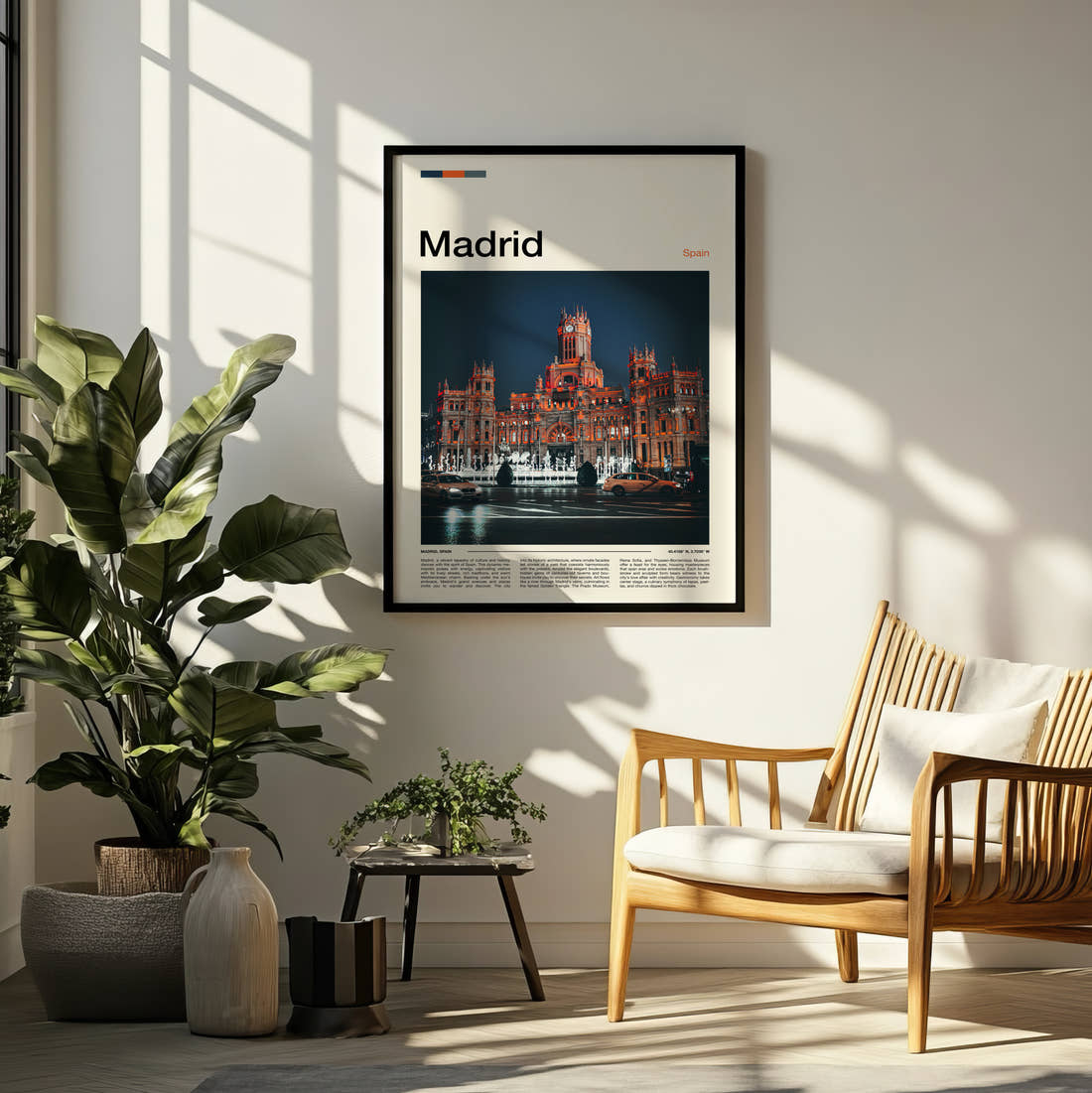 Madrid Cybele Palace Travel Print framed on a pale wall beside houseplants