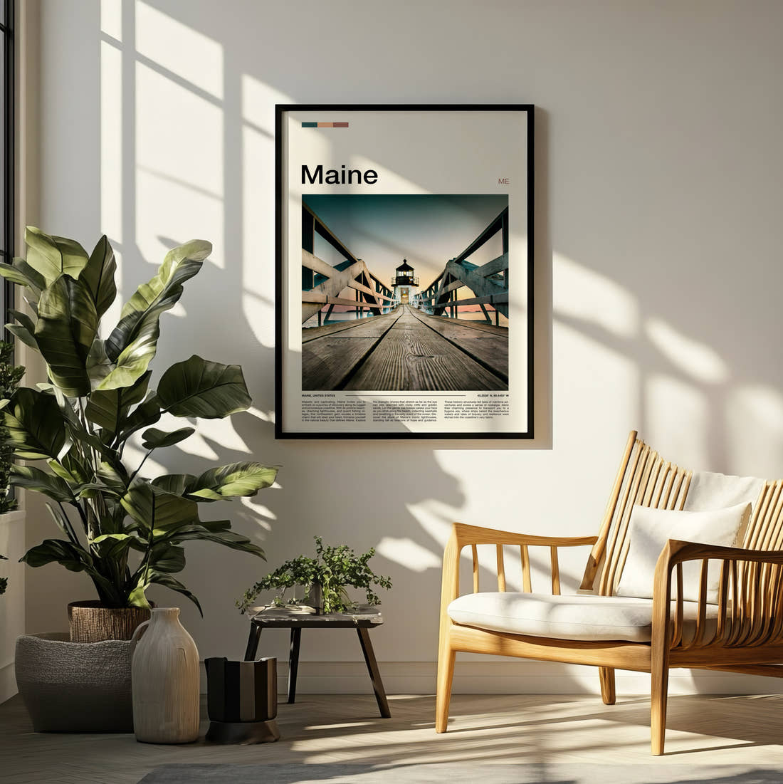 Maine Pier Leading To Lighthouse Travel Print framed on a pale wall beside houseplants