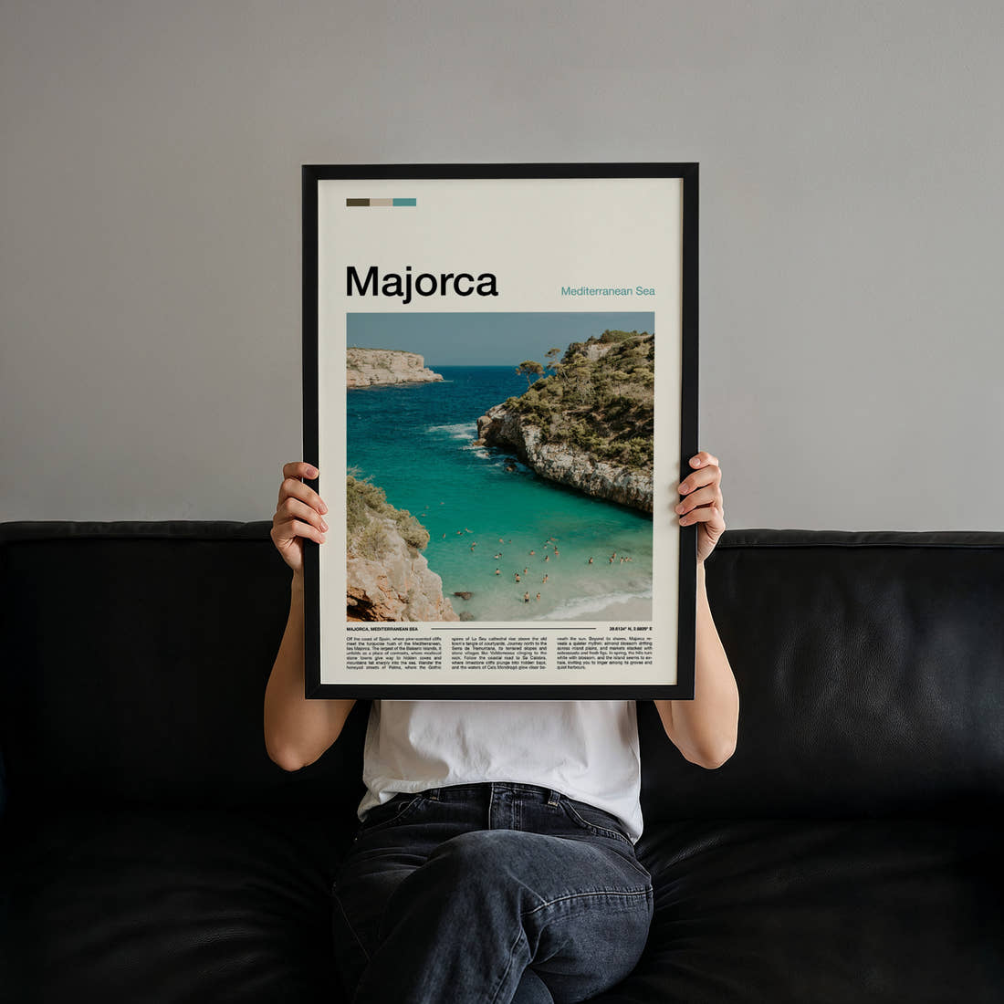 Majorca Turquoise Cove Aerial Travel Print held up by hand to show the size of the print