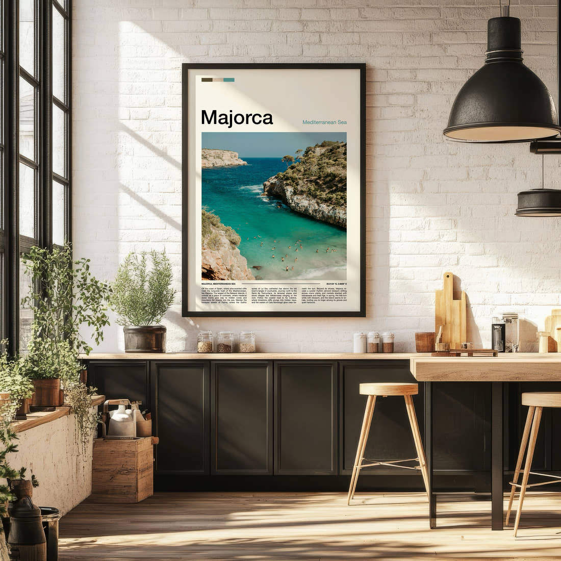 Majorca Turquoise Cove Aerial Travel Print framed on the wall of a bright kitchen and dining space