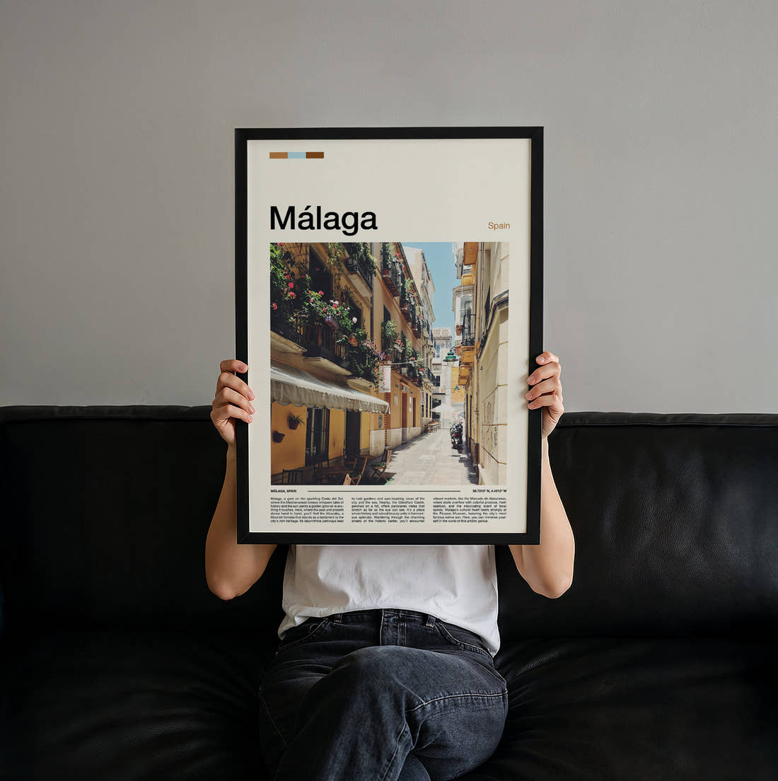Malaga Narrow Old Street Travel Print held up by hand to show the size of the print