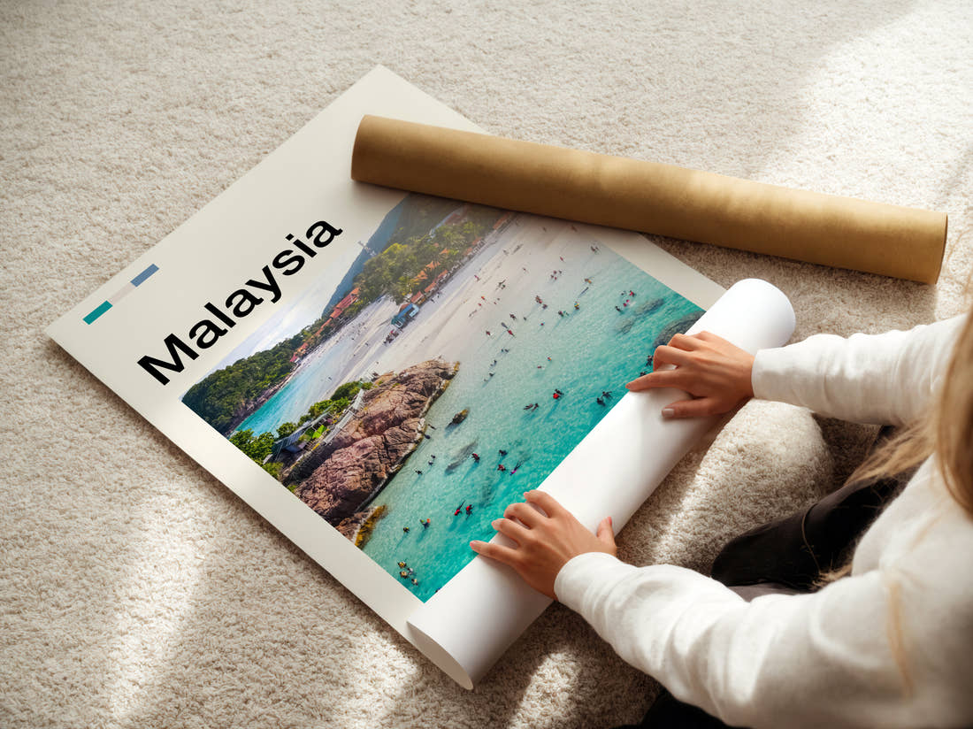 Malaysia Swimmers In Turquoise Water Travel Print being unrolled from its postal tube