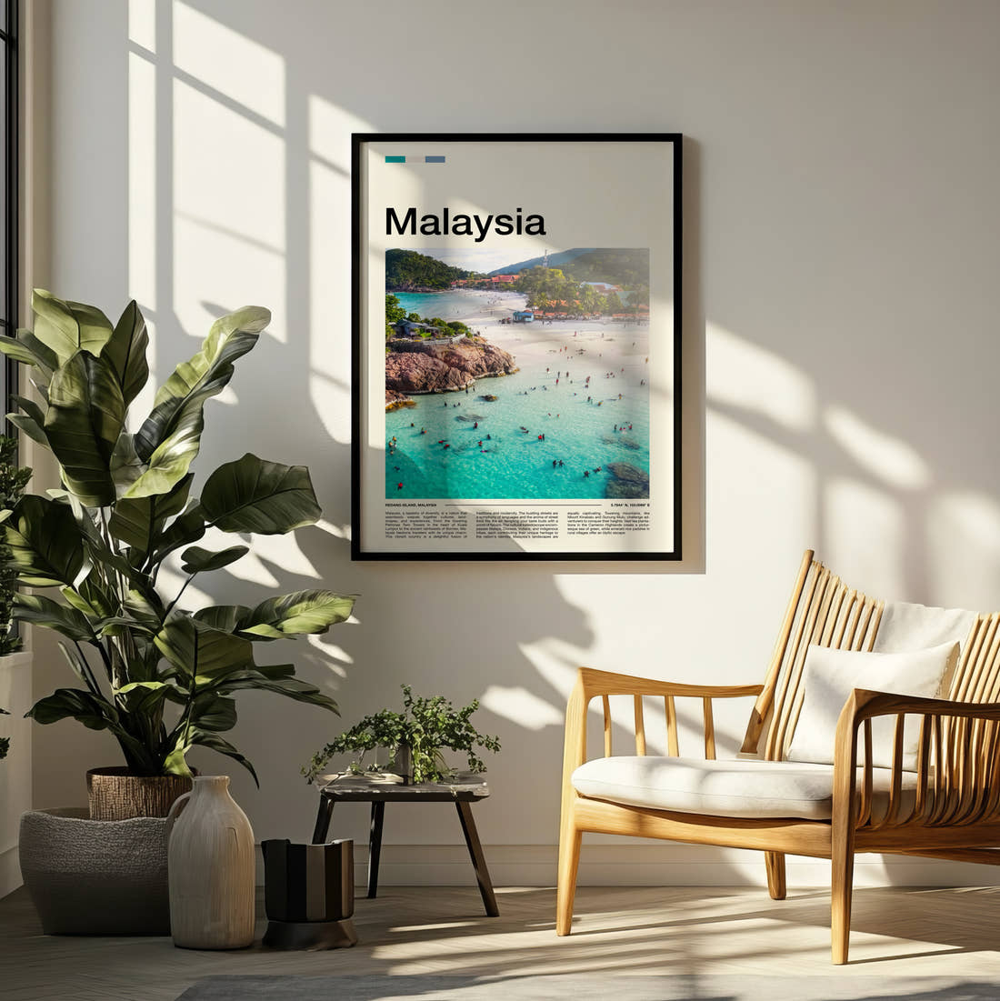 Malaysia Swimmers In Turquoise Water Travel Print framed on a pale wall beside houseplants
