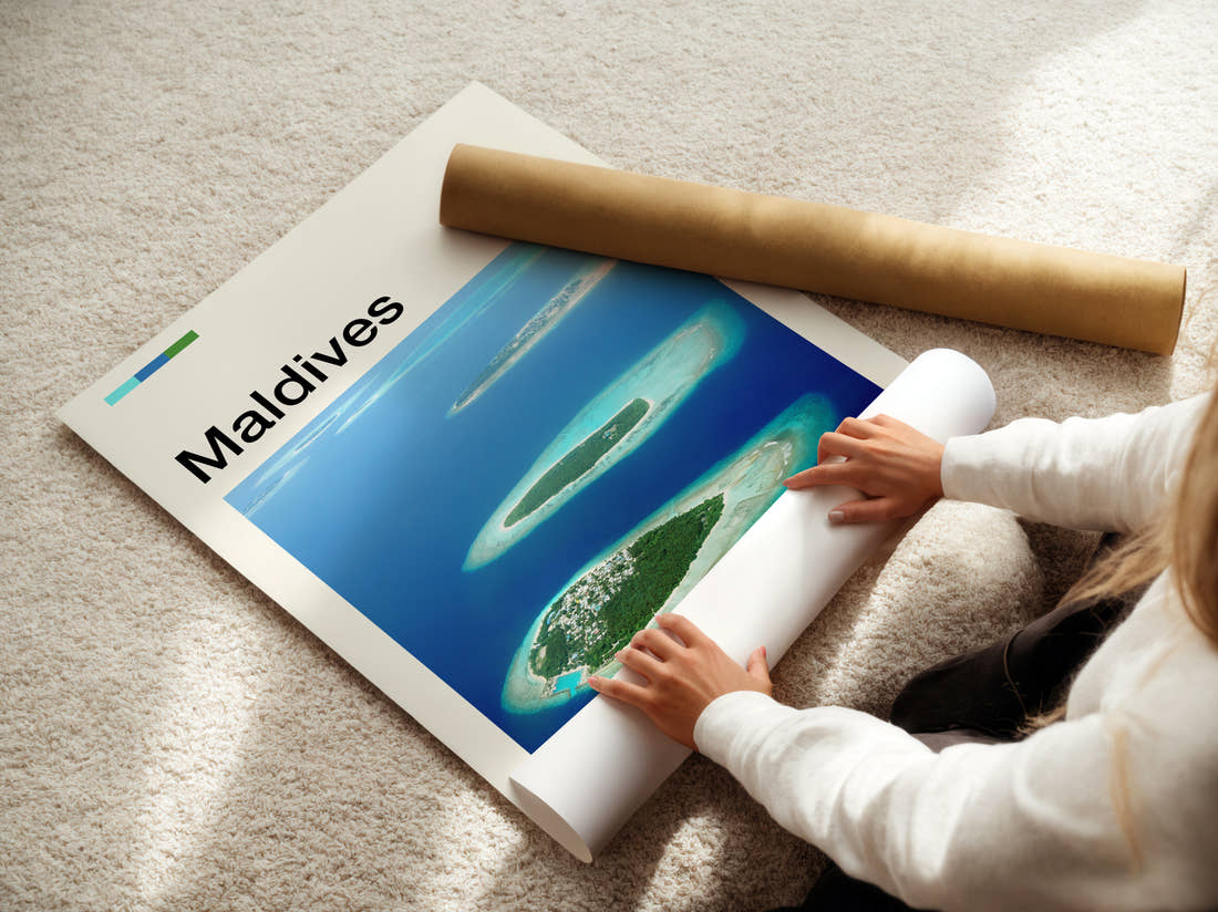 Maldives Small Tropical Islands Travel Print being unrolled from its postal tube