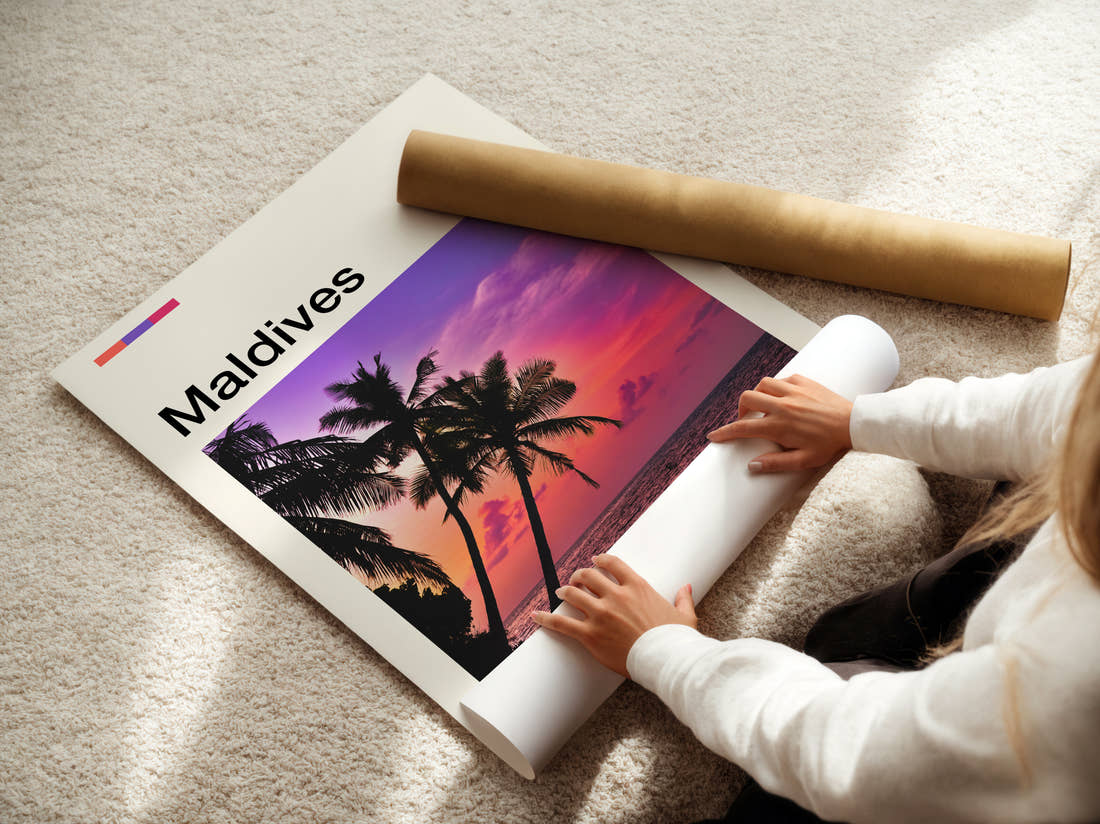 Maldives Pink Sunset Behind Palms Travel Print being unrolled from its postal tube