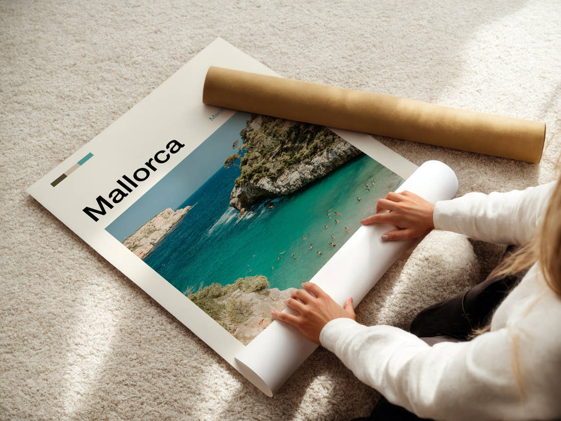 Mallorca Turquoise Cove Swimmers Travel Print being unrolled from its postal tube