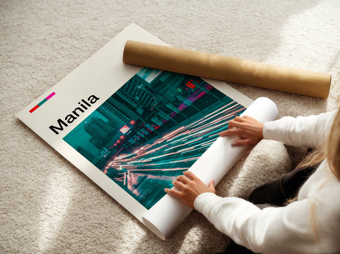 Manila Light Trails At Night Travel Print being unrolled from its postal tube