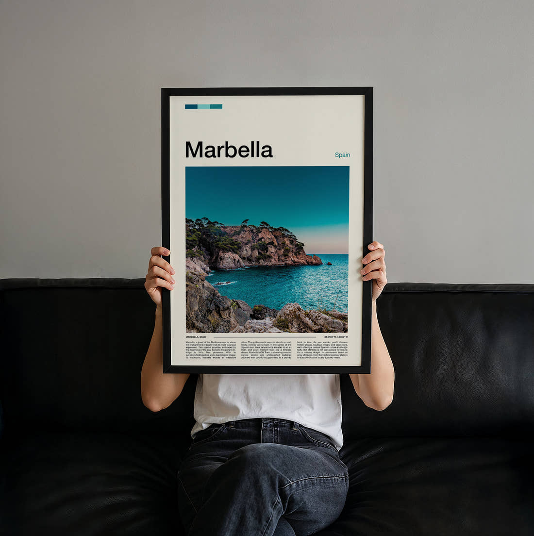 Marbella Rocky Coastline Travel Print held up by hand to show the size of the print