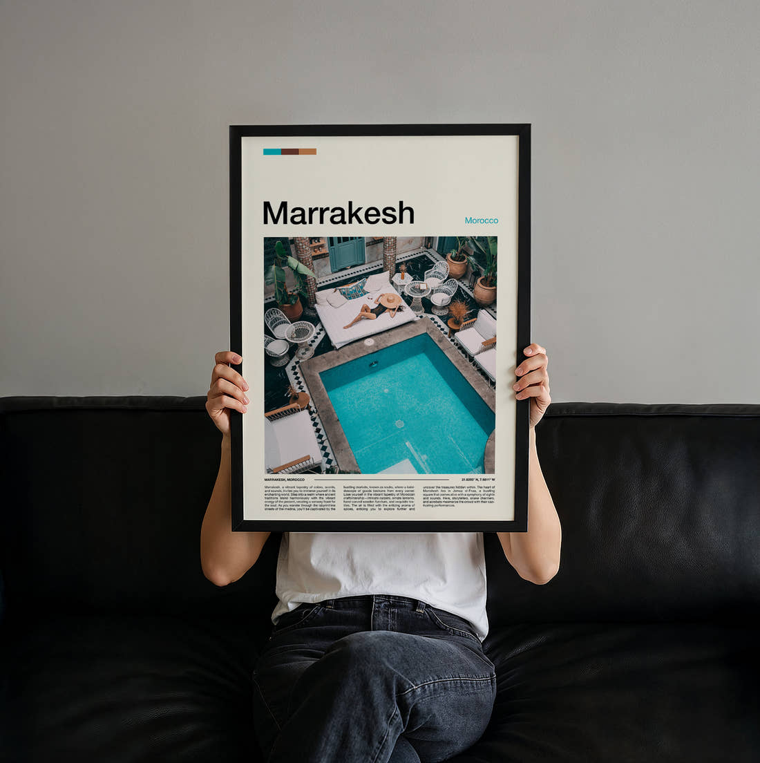 Marrakesh Courtyard Swimming Pool Travel Print held up by hand to show the size of the print