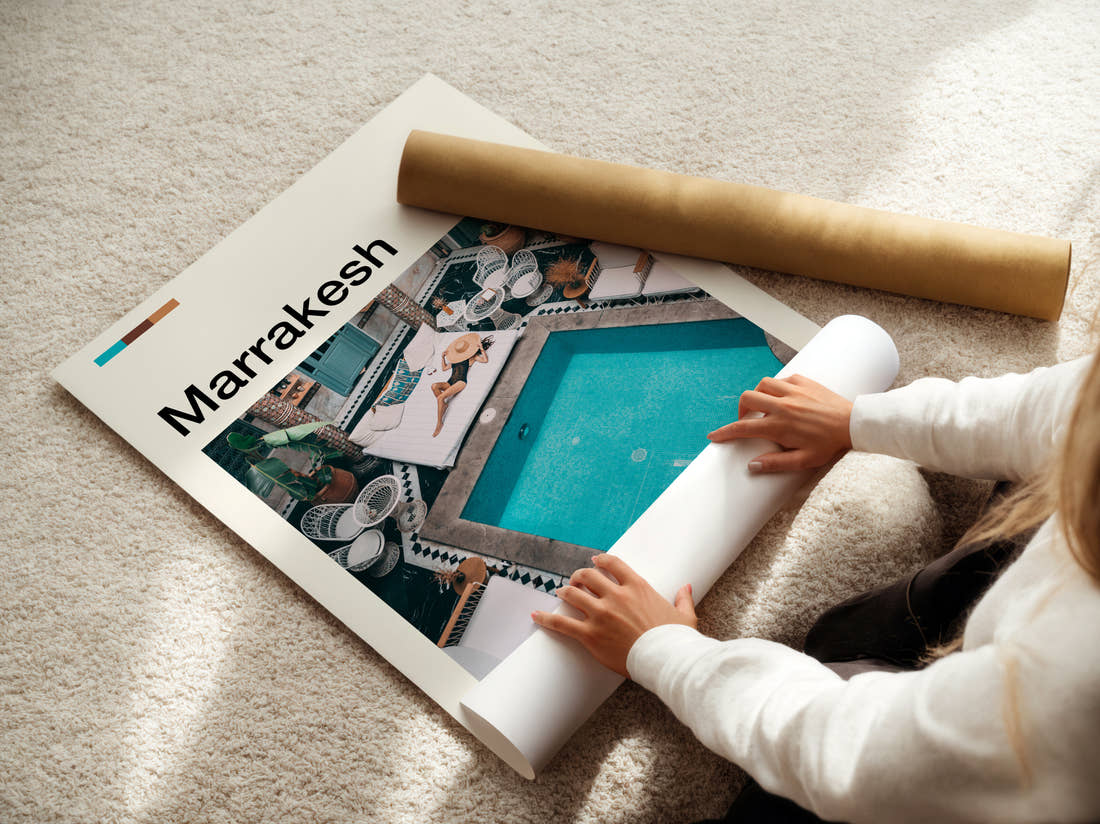 Marrakesh Courtyard Swimming Pool Travel Print being unrolled from its postal tube
