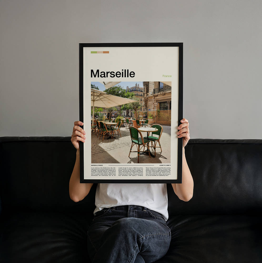 Marseille Cafe Terrace Travel Print held up by hand to show the size of the print