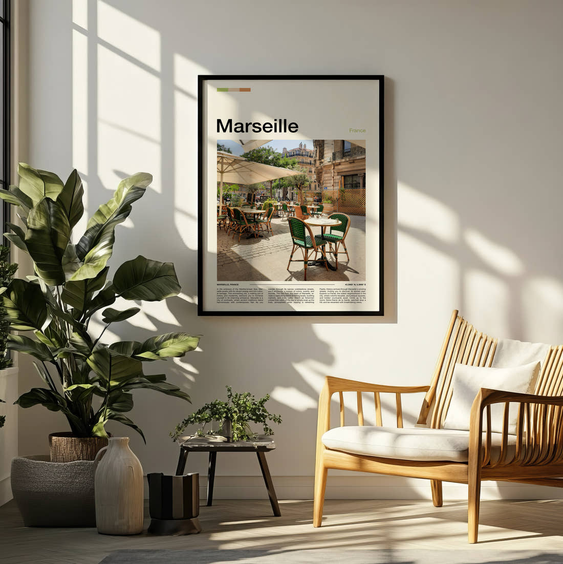Marseille Cafe Terrace Travel Print framed on a pale wall beside houseplants
