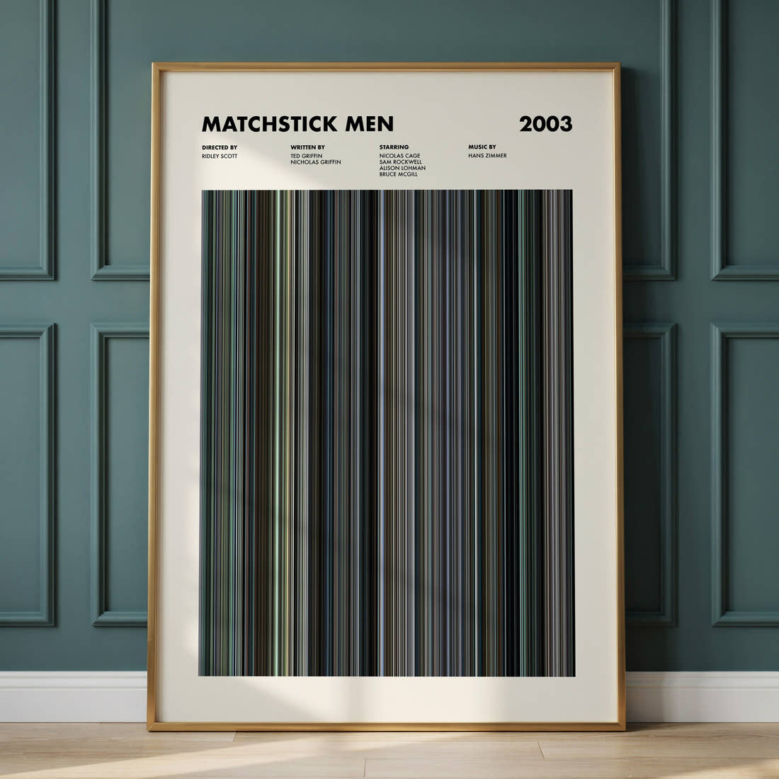 Matchstick Men Movie Barcode Poster framed and leaning against a panelled wall