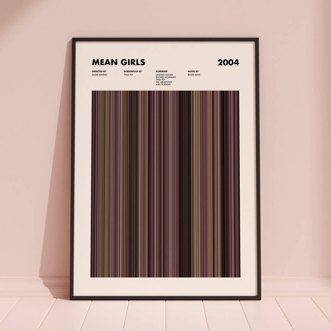 Mean Girls Movie Barcode Poster framed and leaning against a coloured wall