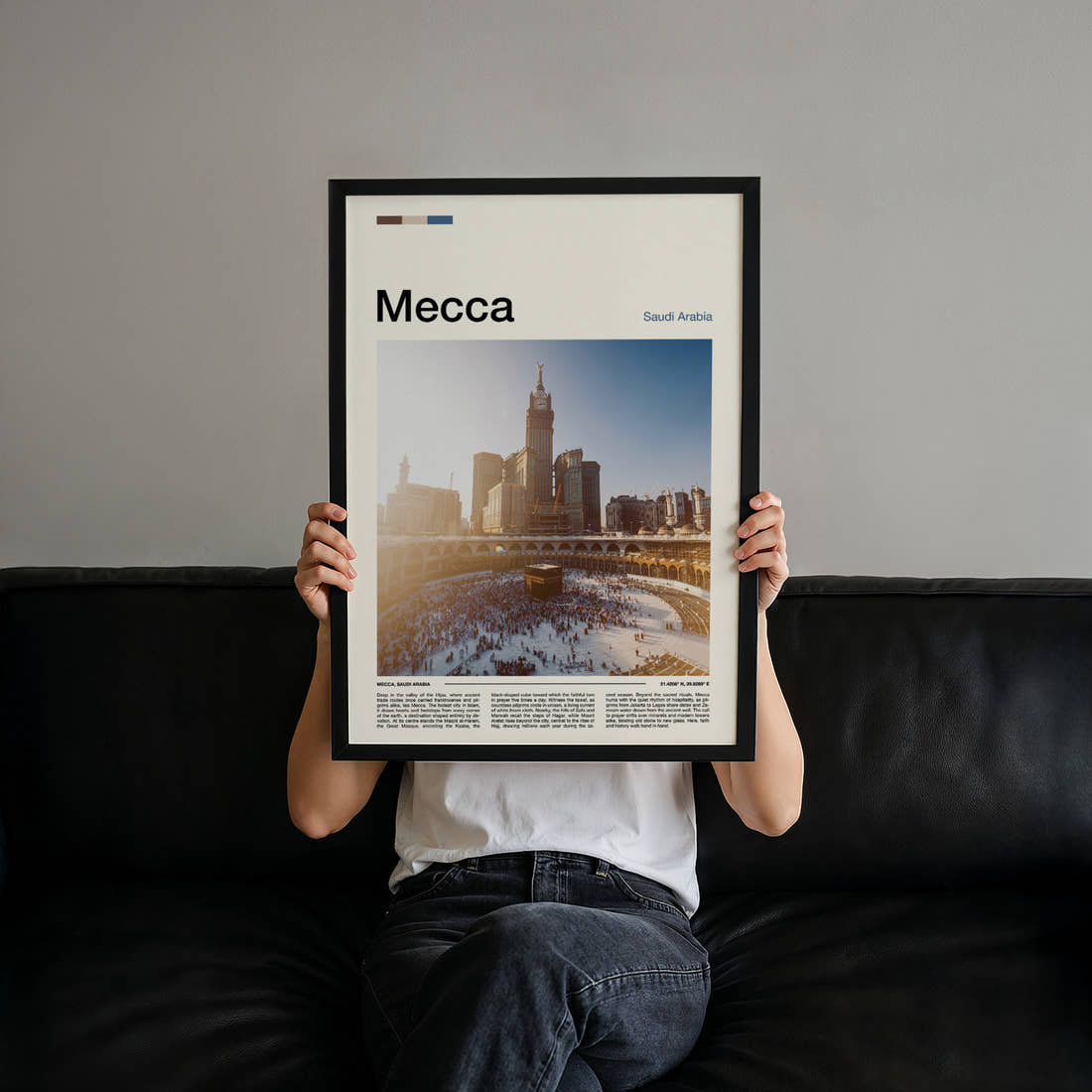 Mecca Kaaba At Dusk Travel Print held up by hand to show the size of the print