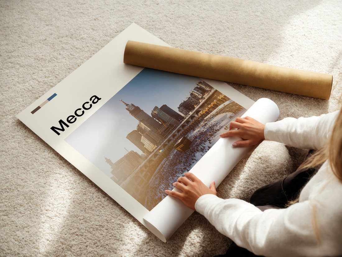 Mecca Kaaba At Dusk Travel Print being unrolled from its postal tube