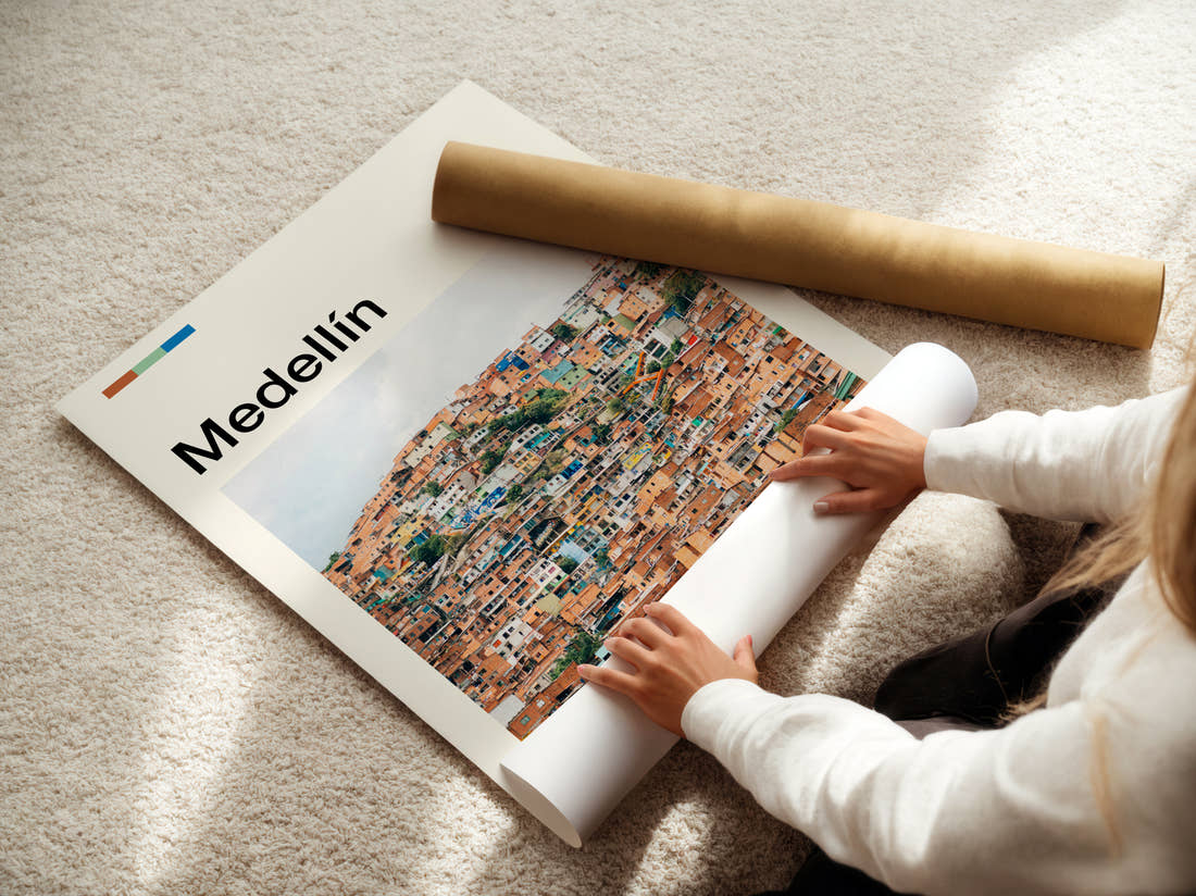 Medellín Colourful Hillside Houses Travel Print being unrolled from its postal tube