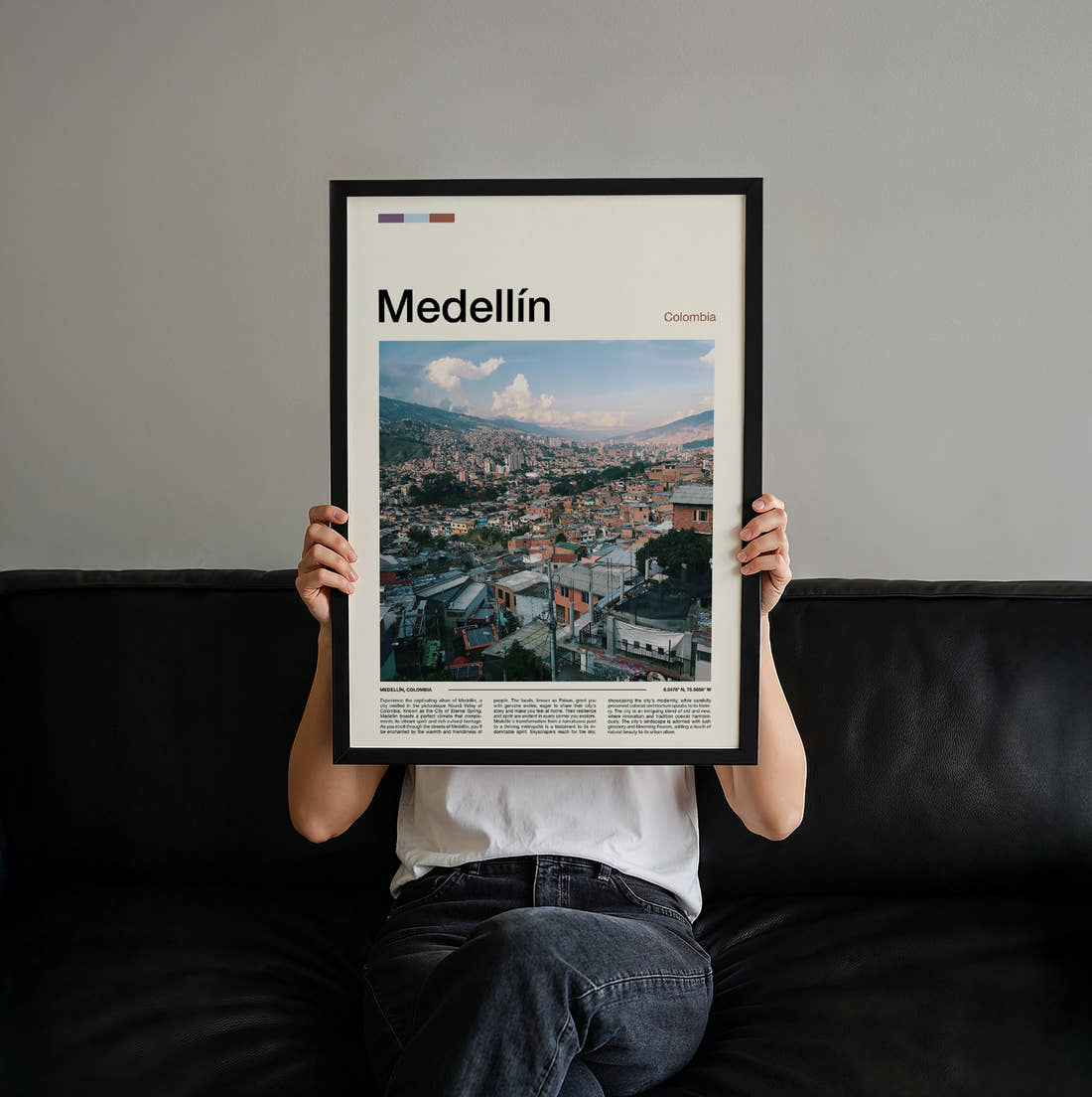 Medellín City In The Valley Travel Print held up by hand to show the size of the print