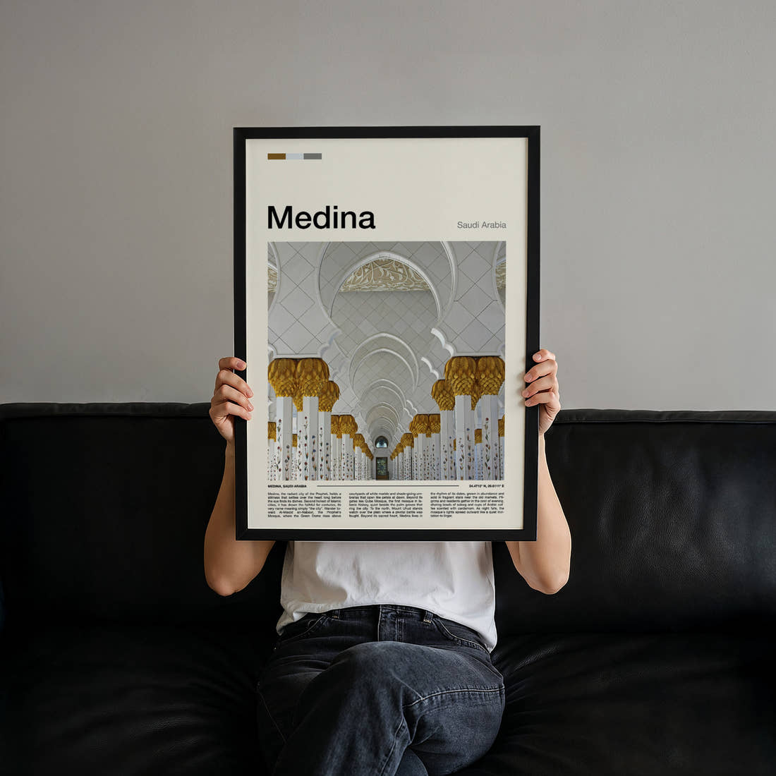 Medina Golden Arches Colonnade Travel Print held up by hand to show the size of the print
