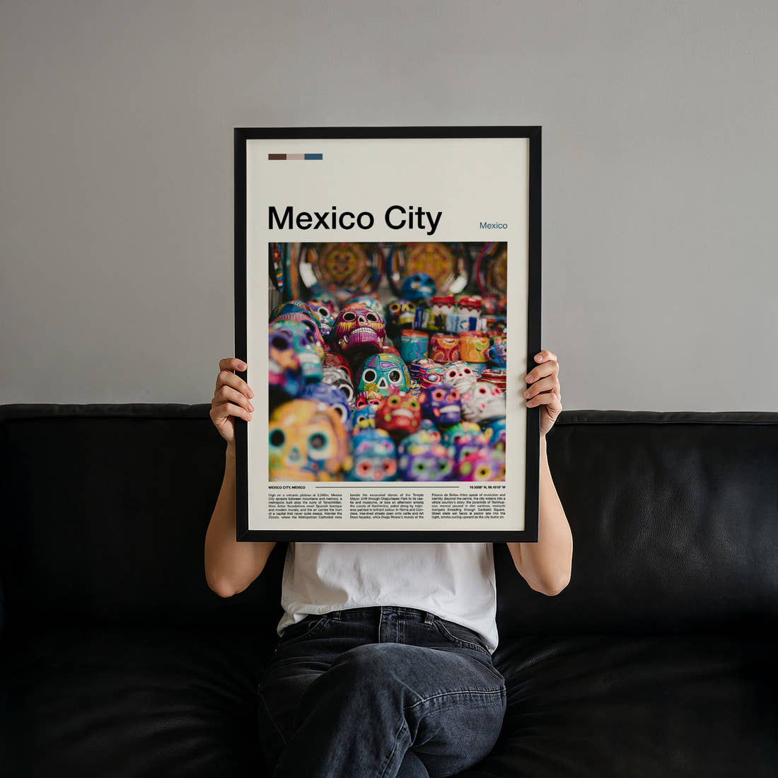 Mexico City Painted Calavera Skulls Travel Print held up by hand to show the size of the print
