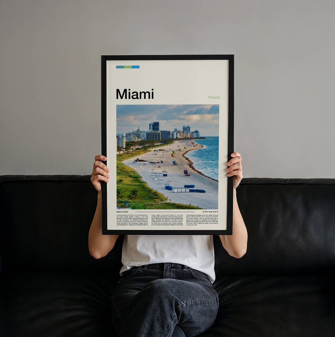 Miami Beach And Skyline Travel Print held up by hand to show the size of the print
