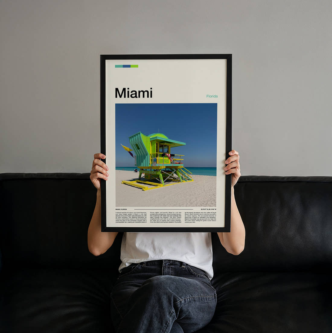 Miami Green Lifeguard Tower Travel Print held up by hand to show the size of the print