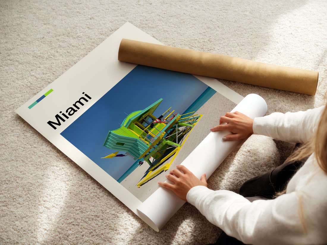 Miami Green Lifeguard Tower Travel Print being unrolled from its postal tube