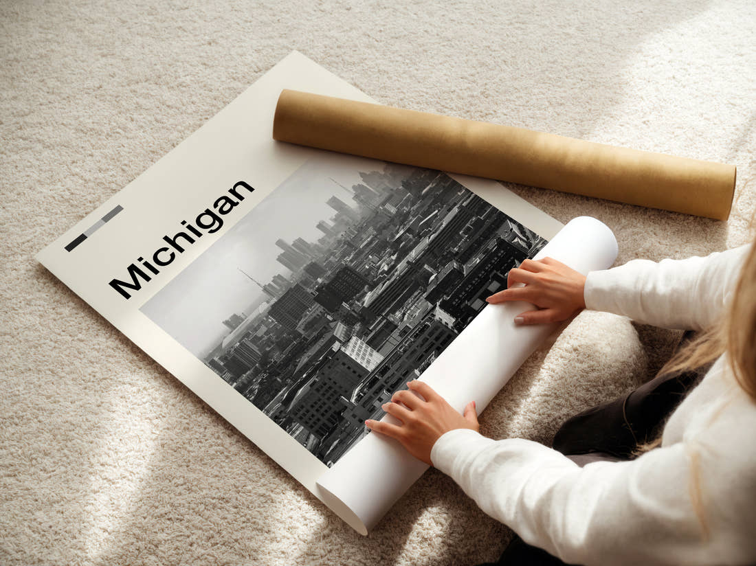 Michigan Black And White Skyline Travel Print being unrolled from its postal tube