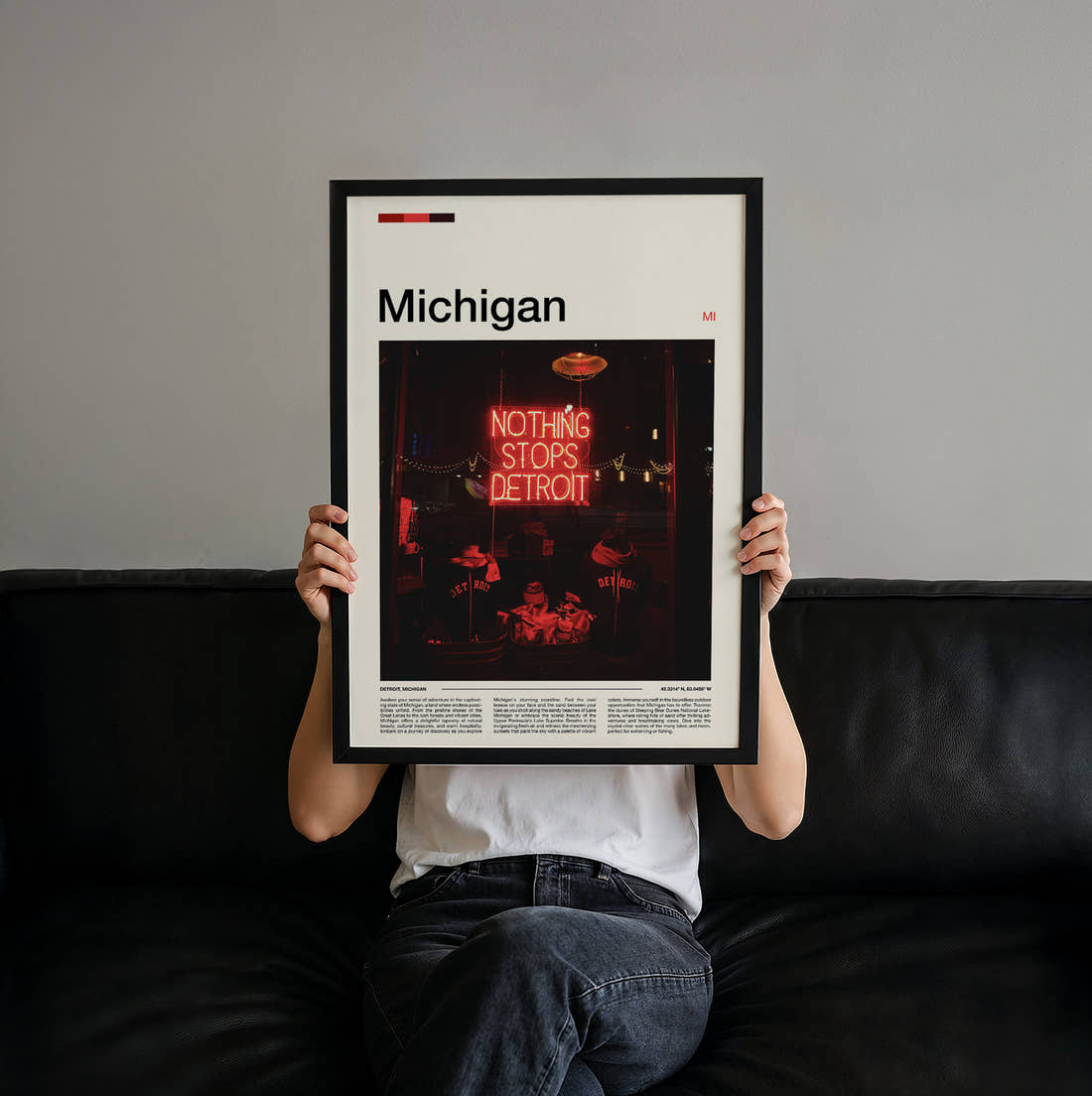 Michigan Red Neon Sign Travel Print held up by hand to show the size of the print