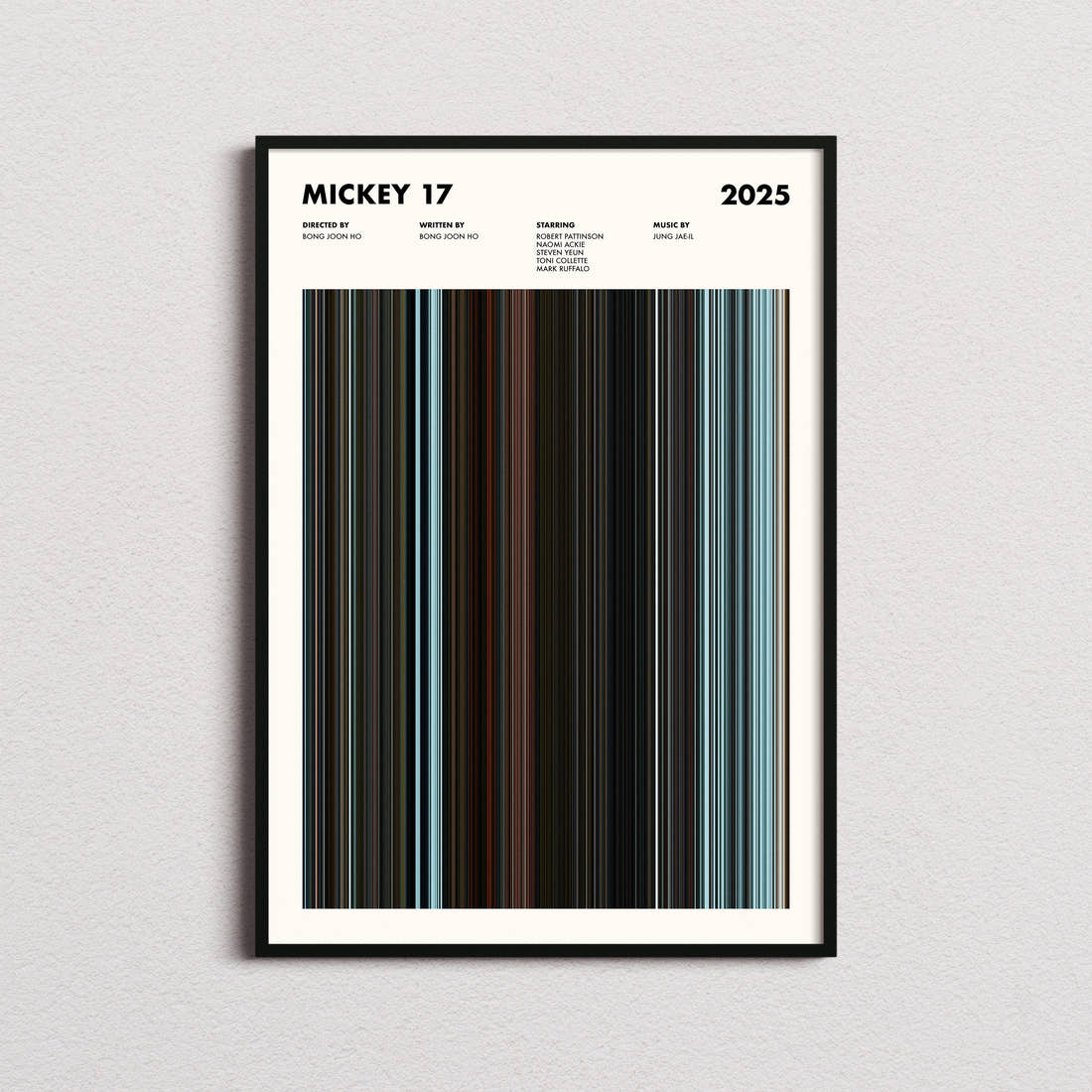 Mickey 17 Movie Barcode Poster framed on a plain studio wall