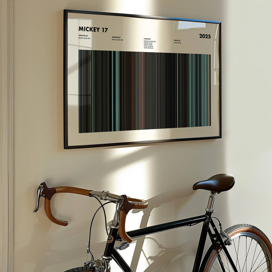 Mickey 17 Movie Barcode Poster framed on the wall of a styled room setting