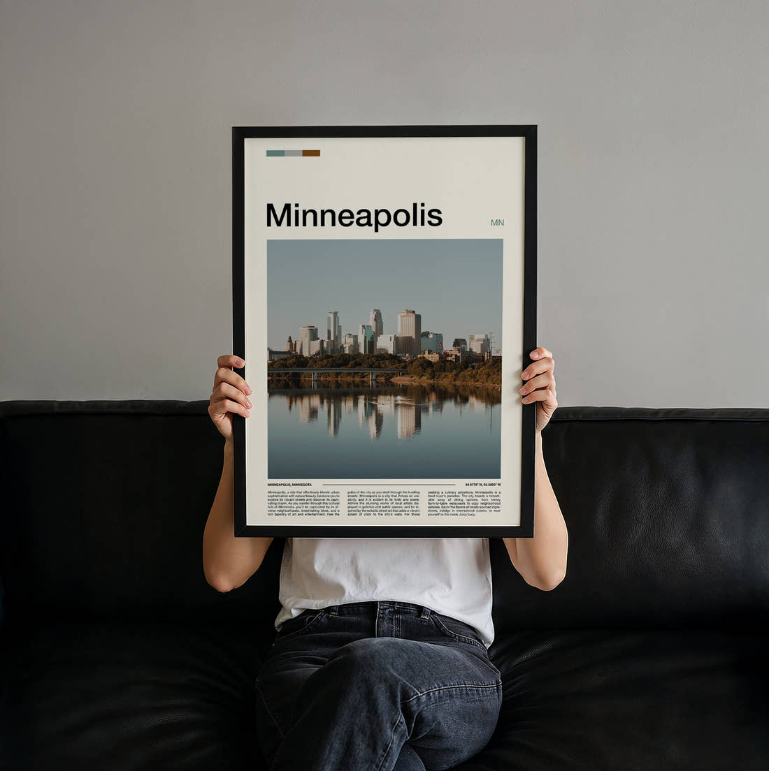 Minneapolis Skyline Reflection Travel Print held up by hand to show the size of the print