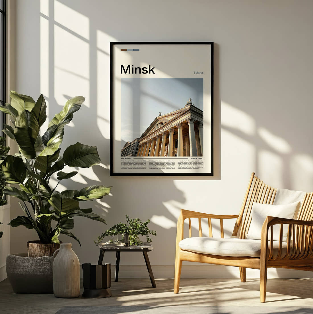 Minsk Columned Facade Travel Print framed on a pale wall beside houseplants