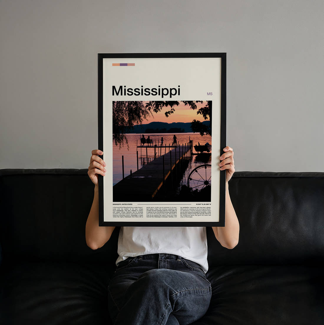 Mississippi Pier At Sunset Travel Print held up by hand to show the size of the print